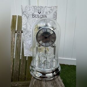 Bulova B8818 Tristan Anniversary Clock 9" Glass Dome Rotating Crystal Silver NIB